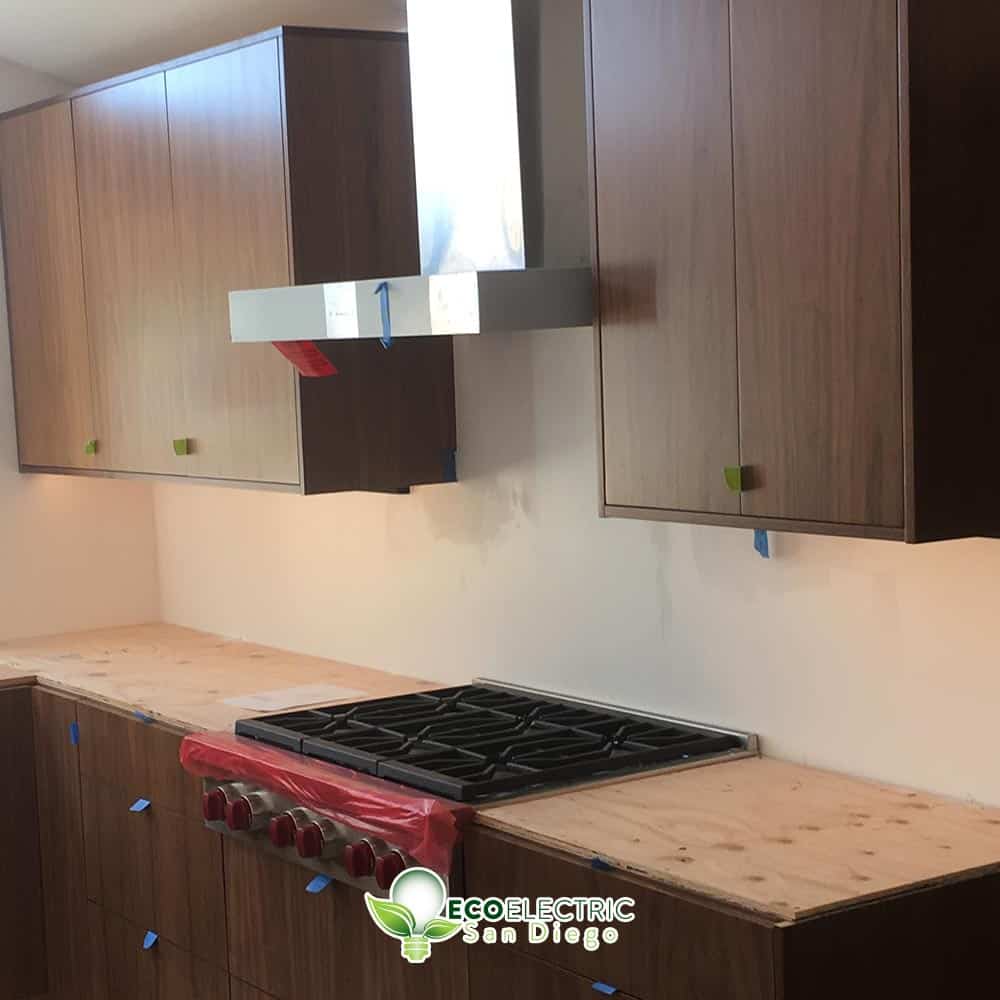 A modern exhaust hood over a stove