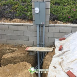 Electrical meter installation with exposed underground wiring