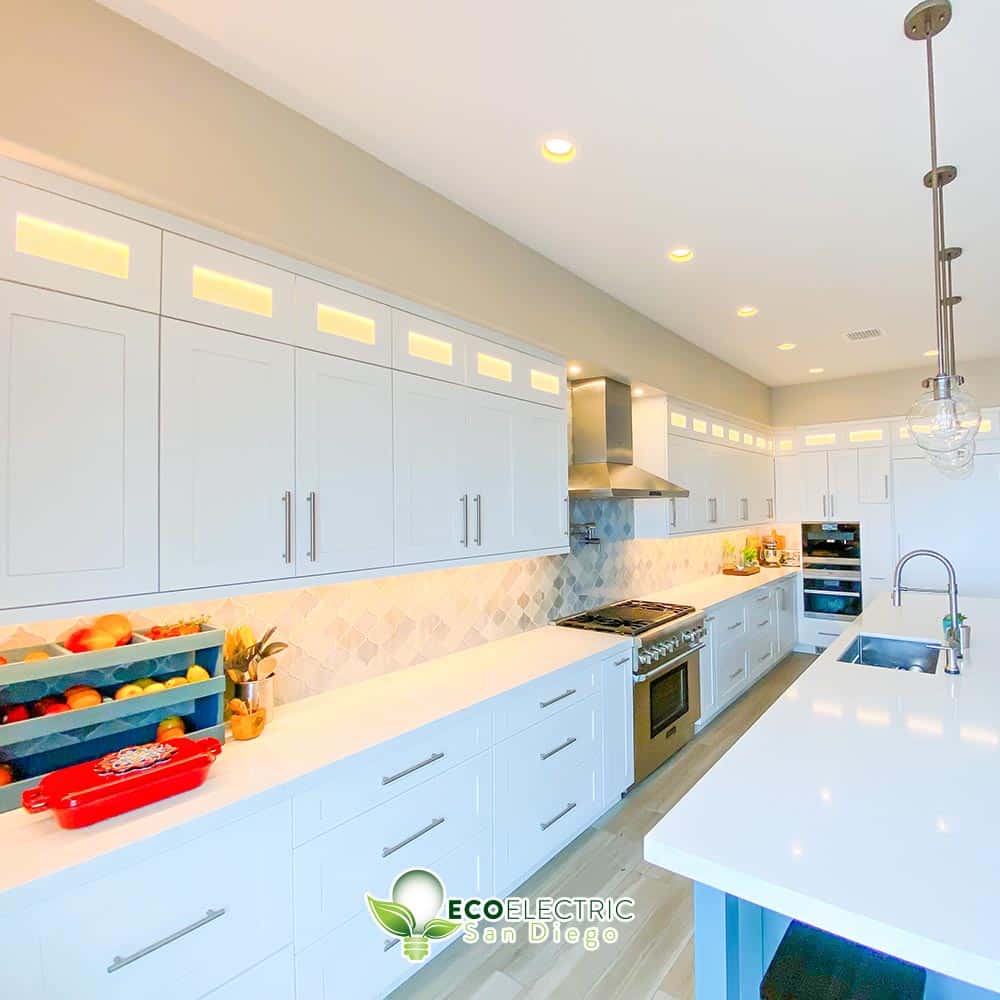 Beautiful kitchen with multiple instances of recessed and backlit lighting