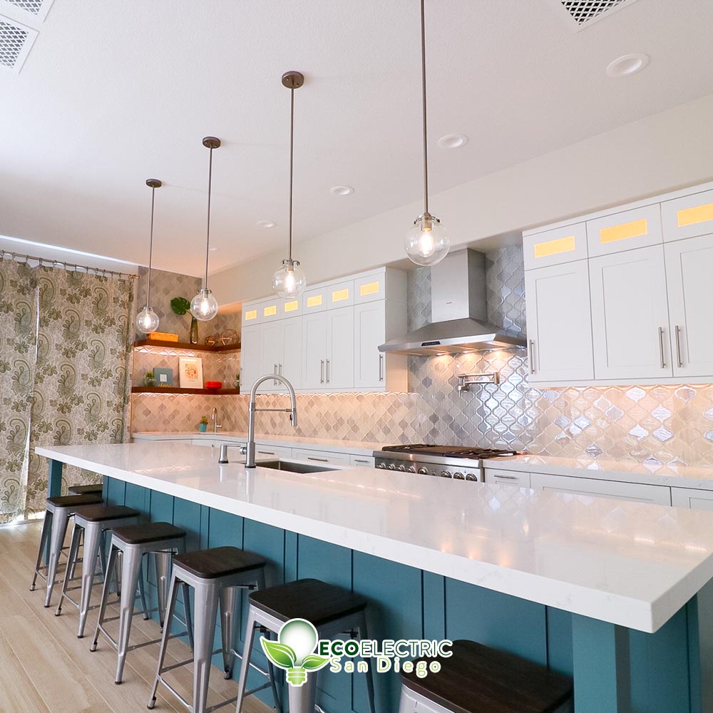 Beautiful kitchen with recessed lighting and 4 hanging light fixtures