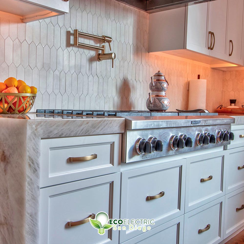 Clean recessed lighting under cabinets next to stove